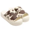 Chuck Taylor All Star Platform Slides „Cowspot Off-White“