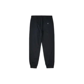 Pánské sportovní kalhoty Converse v jednobarevném provedení s vysokým pasem / kalhoty / joggery – černé Pánské sportovní kalhoty Converse v jednobarevném provedení s vysokým pasem / kalhoty / joggery – černé