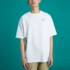 Pánské sportovní tričko Converse Skate s volným potiskem, kulatým výstřihem a krátkými rukávy, bílé
